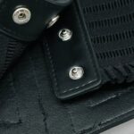 détail œillets métalliques Noctelya